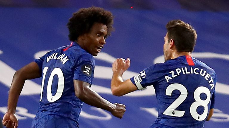 Willian celebrates scoring Chelsea's second goal against Manchester City from the penalty spot with Cesar Azpilicueta