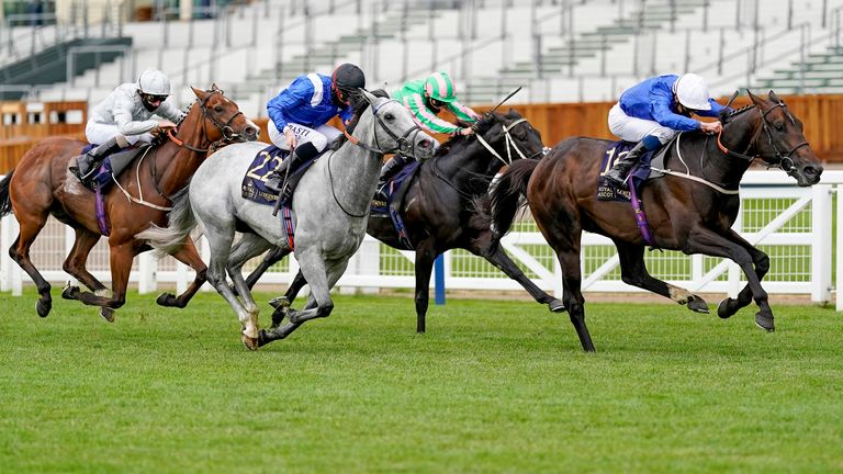 William Buick riding Dark Vision (R) win the Royal Hunt Cup at Ascot Racecourse 