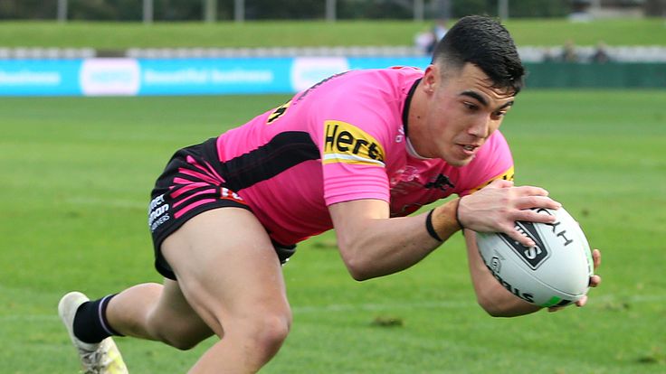 SYDNEY, AUSTRALIA - JULY 11: Charles Staines of the Panthers scores a try during the round nine NRL match between the Cronulla Sharks and the Penrith Panthers at Netstrata Jubilee Stadium on July 11, 2020 in Sydney, Australia. (Photo by Jason McCawley/Getty Images)