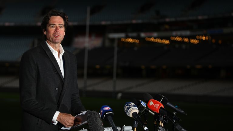 AFL chief executive Gillon McLachlan says the league will set-up a 'transition hub' to allow players' families to join them in Queensland