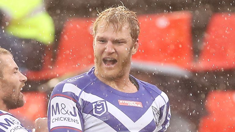 NEWCASTLE, AUSTRALIA - JULY 26: Aiden Tolman of the Bulldogs celebrates scoring a try during the round 11 NRL match between the Newcastle Knights and the Canterbury Bulldogs at McDonald Jones Stadium on July 26, 2020 in Newcastle, Australia. (Photo by Mark Kolbe/Getty Images)