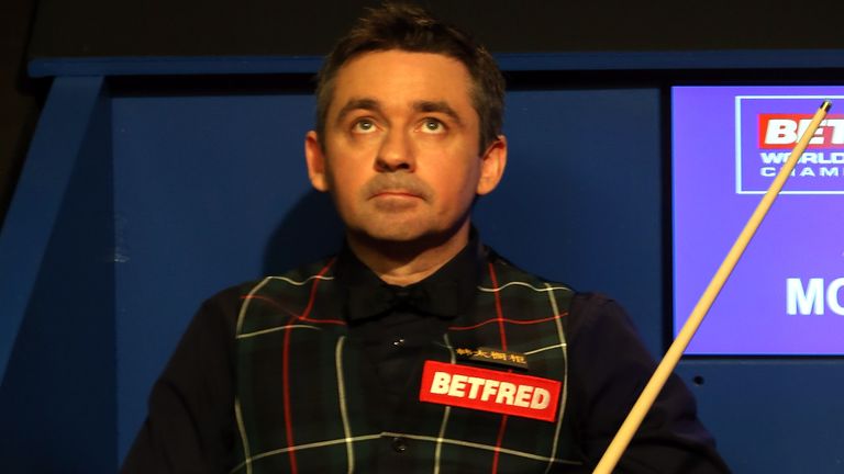Alan McManus of Scotland reacts during his semi final match against Ding Junhui of China on day fourteen of the World Championship Snooker at Crucible Theatre on April 29, 2016 in Sheffield, England.