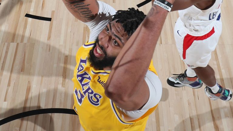 Anthony Davis rams home a dunk in the Lakers' restart game against the Clippers
