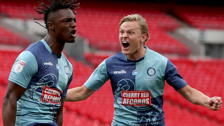 Anthony Stewart celebrates after his header was deflected into the goal to give Wycombe the lead