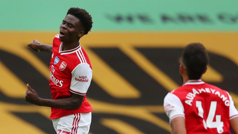 Bukayo Saka celebrates the opening goal for Arsenal against Wolves.