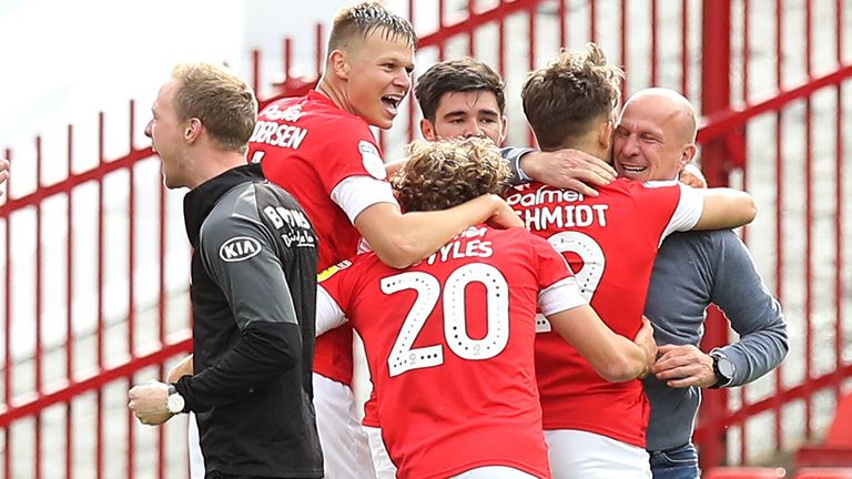 Patrick Schmidt celebrates scoring Barnsley's late winner to keep their survival hopes alive