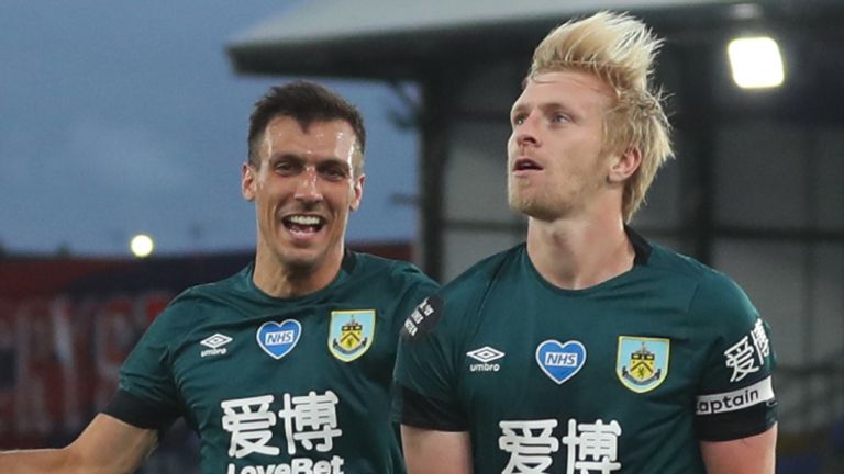 LONDON, ENGLAND - JUNE 29: Ben Mee of Burnley celebrates with Jack Cork and Dwight McNeil after scoring his team's first goal during the Premier League match between Crystal Palace and Burnley FC at Selhurst Park on June 29, 2020 in London, United Kingdom. (Photo by Catherine Ivill/Getty Images)