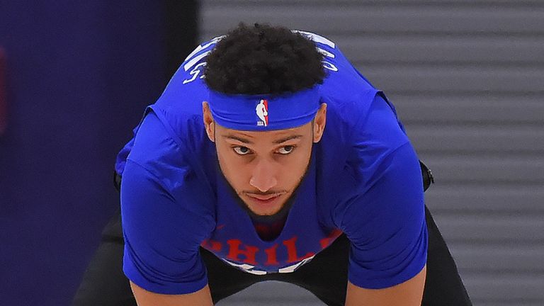 Ben Simmons stretches at a Philadelphia 76ers practice at the NBA&#39;s central Florida campus