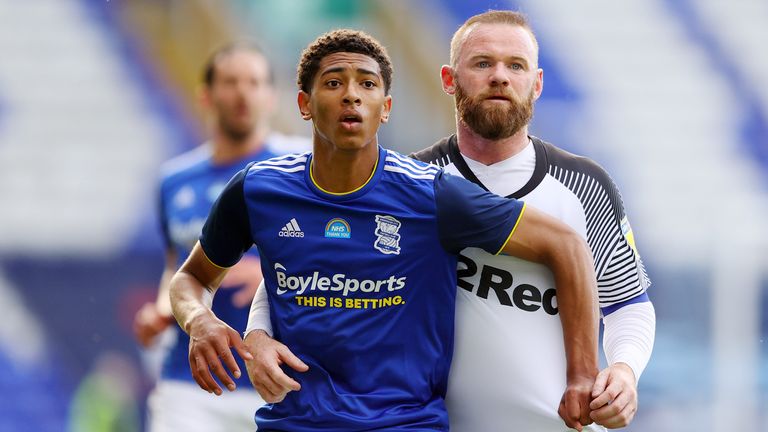 Birmingham City's Jude Bellingham and Derby County's Wayne Rooney