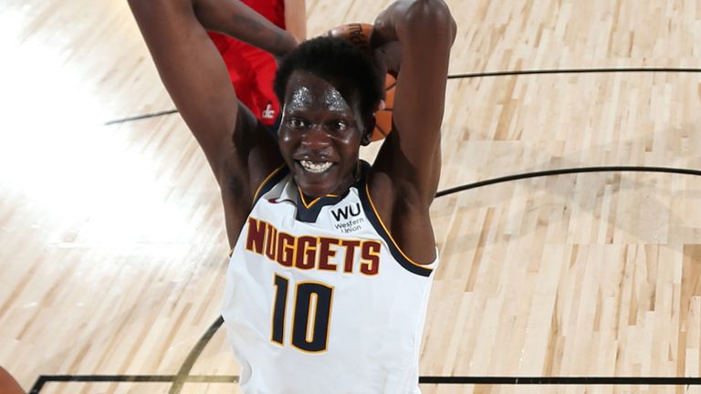 Nuggets rookie Bol Bol soars for a dunk against the Wizards