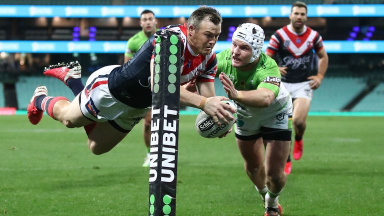 Brett Morris dives over to score for the Roosters