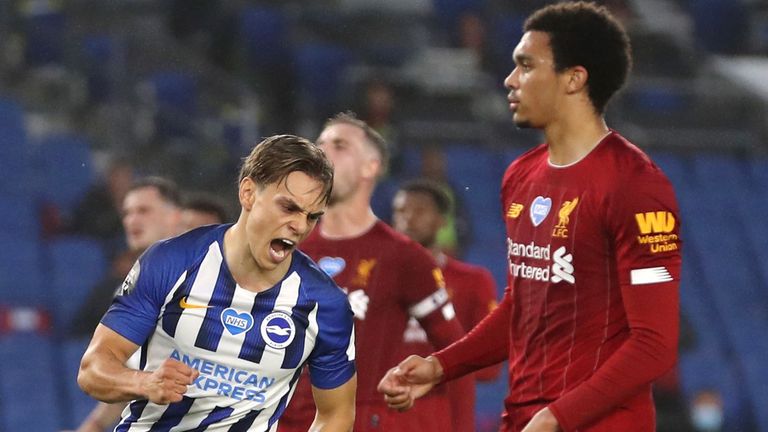 Leandro Trossard of Brighton celebrates after he scores against Liverpool