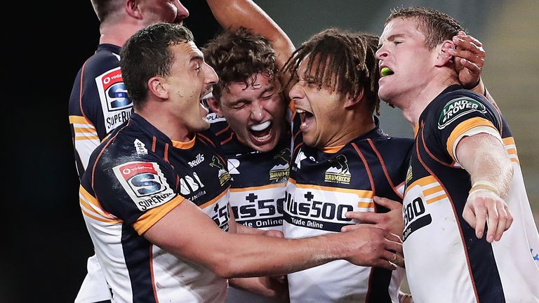 The Brumbies celebrate the late Issak Fines try which earned them victory over the Waratahs.