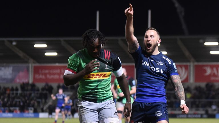 Byron McGuigan of Sale Sharks celebrates as Sam James scores against Harlequins