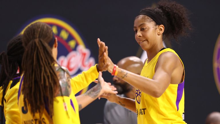 Candace Parker high-fives her Sparks' team-mate during their win over the Connecticut Sun