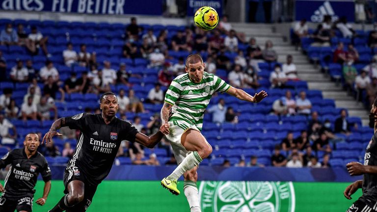 Marcelo (L) vies with Celtic forward Patryk Klimala