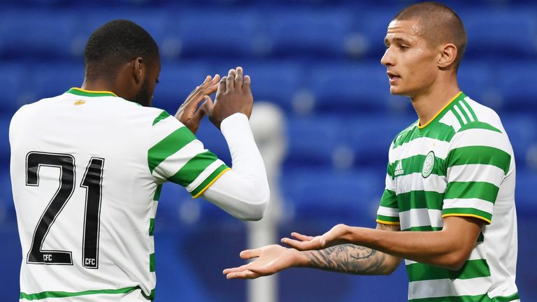 Patryk Klimala (right) celebrates his goal against Nice with Olivier Ntcham