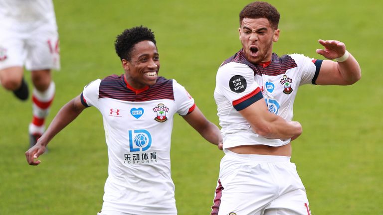 Che Adams celebrates his late goal to wrap up the points