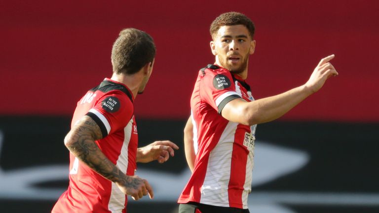 Che Adams celebrates his speculative opener at St Mary's