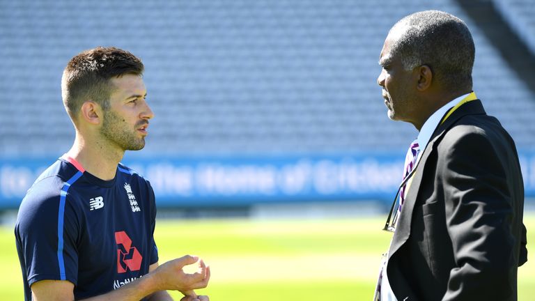 Michael Holding (R) advised England's Mark Wood to bowl off a shorter run-up