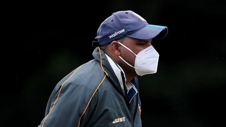 The umpires wore protective face masks in the first match of the summer at Indian Gymkhana Cricket Club, Osterley