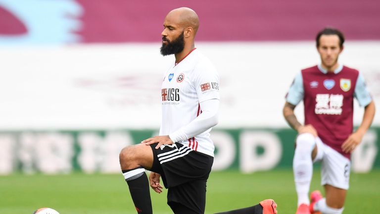 David McGoldrick takes the knee 