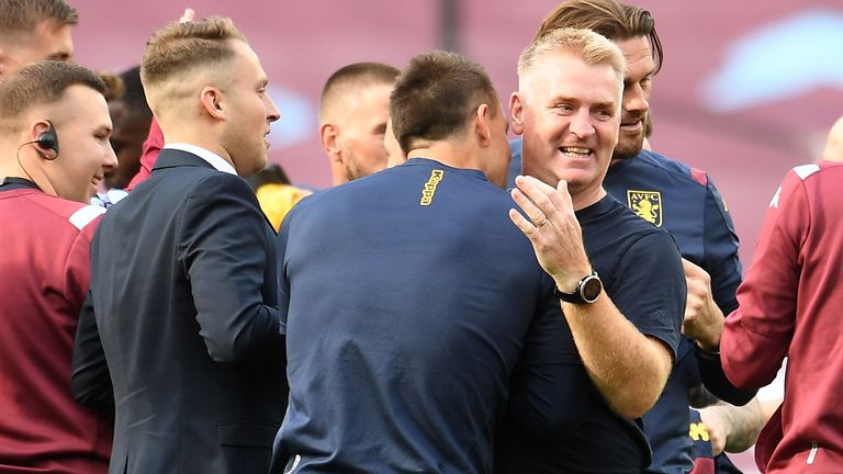 Dean Smith celebrates Aston Villa's Premier League survival