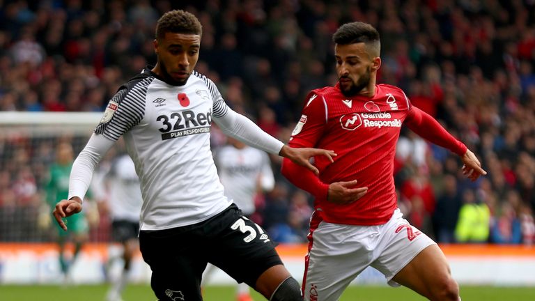 Jayden Bogle (L) in action against Tiago Silva as Nottingham Forest beat Derby 1-0 at the City Ground.