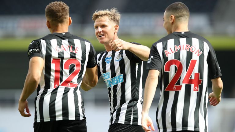 Dwight Gayle celebrates his early goal with teammates