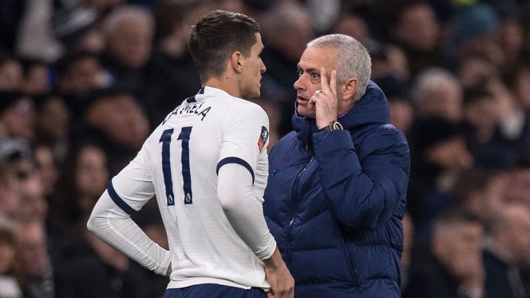 Tottenham midfielder Erik Lamela talks to manager Jose Mourinho