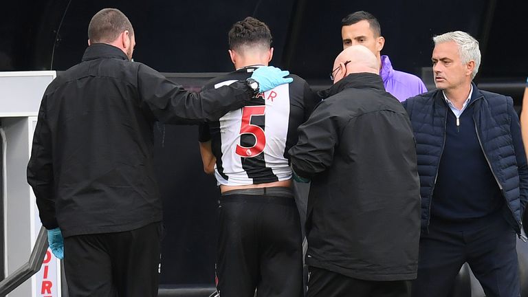 Newcastle defender Fabian Schar comes off injured in the 3-1 home defeat to Tottenham