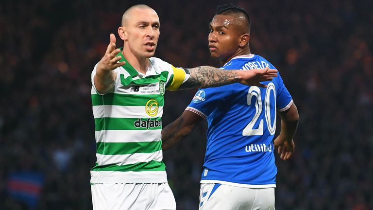 Scott Brown and Alfredo Morelos in action