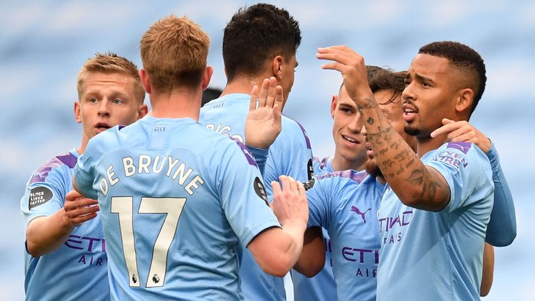 MANCHESTER, ENGLAND - JULY 08: Gabriel Jesus of Manchester City celebrates with his team after scoring his teams first goal during the Premier League match between Manchester City and Newcastle United at Etihad Stadium on July 08, 2020 in Manchester, England