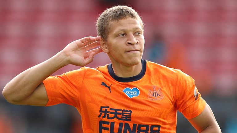 Newcastle United's English striker Dwight Gayle celebrates after he scores his team's first goal during the English Premier League football match between Bournemouth and Newcastle United at the Vitality Stadium in Bournemouth,