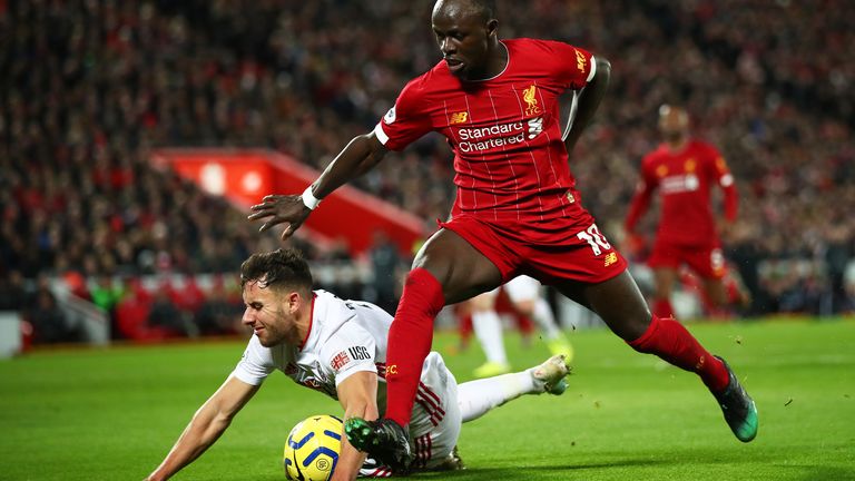 George Baldock struggles to contain Sadio Mane during Sheffield United's 2-0 defeat at Anfield in January