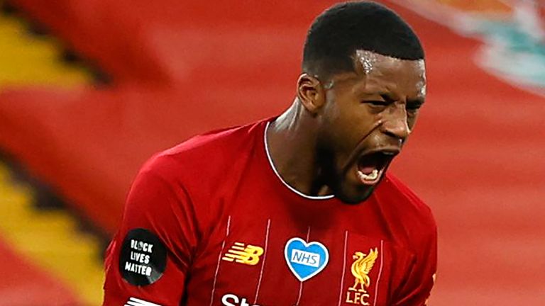 Georginio Wijnaldum of Liverpool celebrates after scoring his team's third goal during the Premier League match between Liverpool FC and Chelsea FC at Anfield