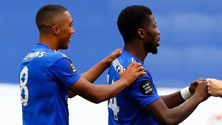 Kelechi Iheanacho is congratulated by Youri Tielemans (left) for opening the scoring against Crystal Palace