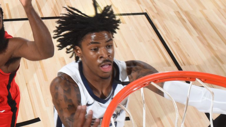 Ja Morant attacks the rim against the Houston Rockets