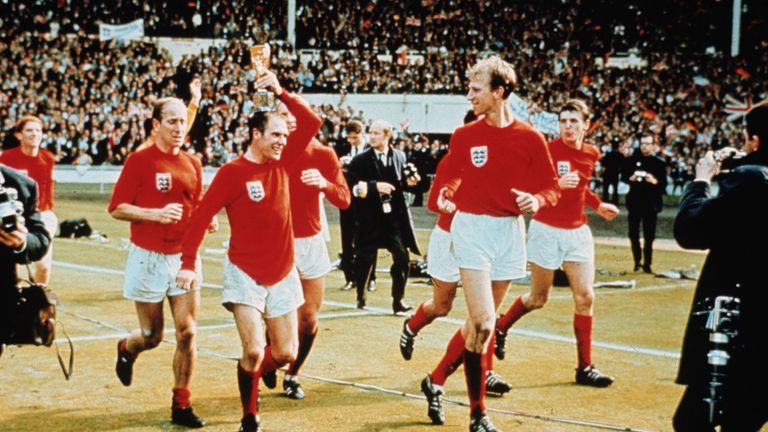 Charlton celebrates winning the World Cup with England in 1996