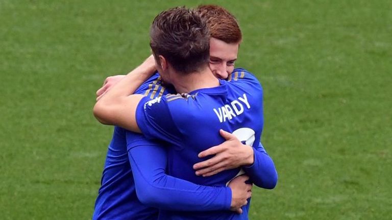 Jamie Vardy celebrates his 100th Premier League goal with Harvey Barnes