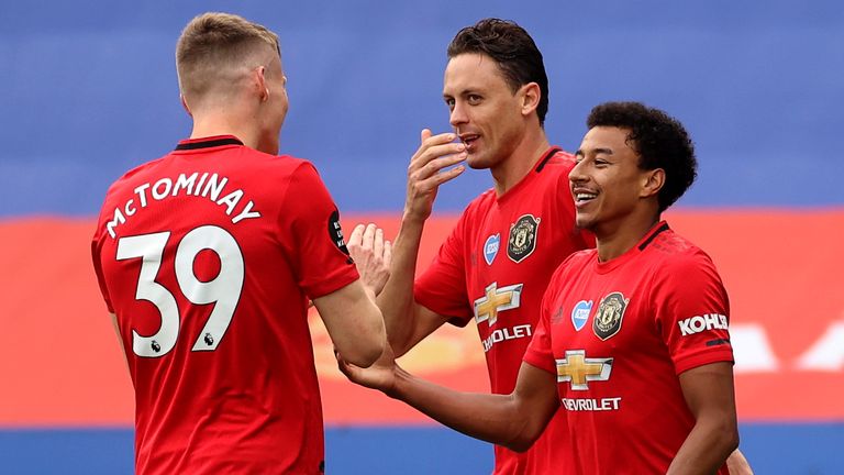 Jesse Lingard celebrates with teammates after doubling Man Utd's lead