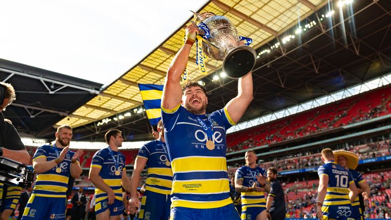 Picture by Richard Blaxall/SWpix.com - 24/08/2019 - Rugby League - Coral Challenge Cup Final - St Helens v Warrington Wolves - Wembley Stadium, London, England - Joe Philbin of Warrington Wolves lifts the trophy