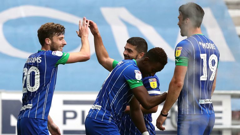 Joe Williams celebrates scoring Wigan's seventh after 45 minutes