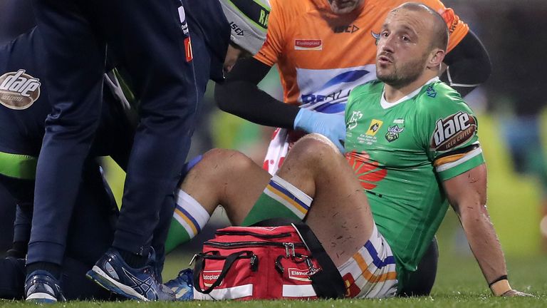 CANBERRA, AUSTRALIA - JULY 11: Josh Hodgson of the Raiders is attended to by trainers and leaves the field during the round nine NRL match between the Canberra Raiders and the Melbourne Storm at GIO Stadium on July 11, 2020 in Canberra, Australia. (Photo by Matt King/Getty Images)