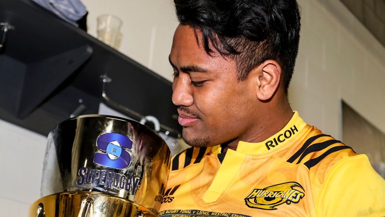 Julian Savea of the Hurricanes holds the Super Rugby Trophy after the 2016 Super Rugby Final match between the Hurricanes and the Lions at Westpac Stadium on August 6, 2016 in Wellington, New Zealand.