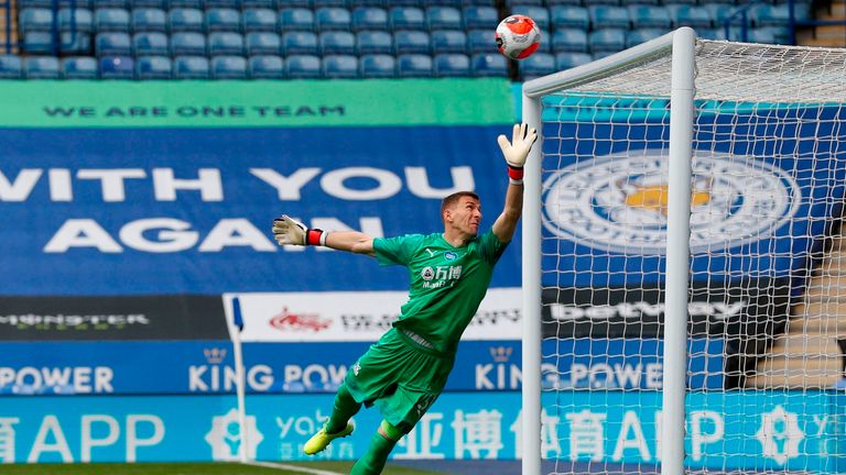 Crystal Palace's Spanish goalkeeper Vicente Guaita watches as a shot hits the crossbar during the English Premier League football match between Leicester City and Crystal Palace at King Power Stadium in Leicester, central England on July 4, 2020.