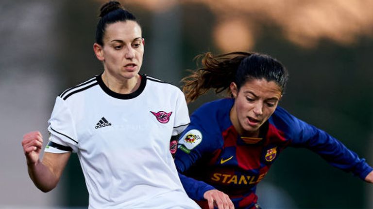 Aurelie Kaci of CD Tacon battle for the ball with Aitana Bonmatí of FC Barcelona