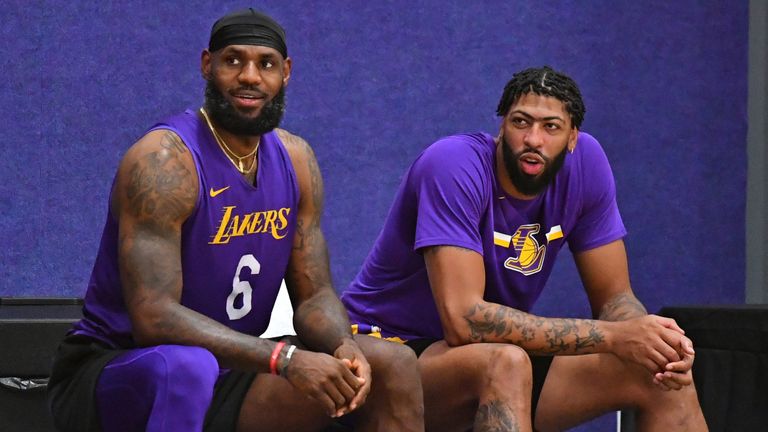 LeBron James and Anthony Davis enjoy a break at Lakers practice in Orlando