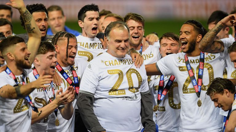 Marcelo Bielsa and the players celebrate winning the Sky Bet Championship.