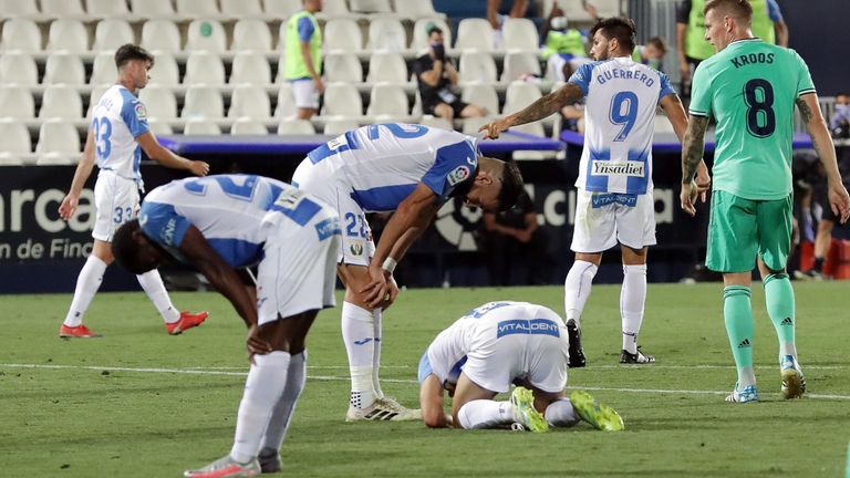 Leganes players look dejected as their side are relegated